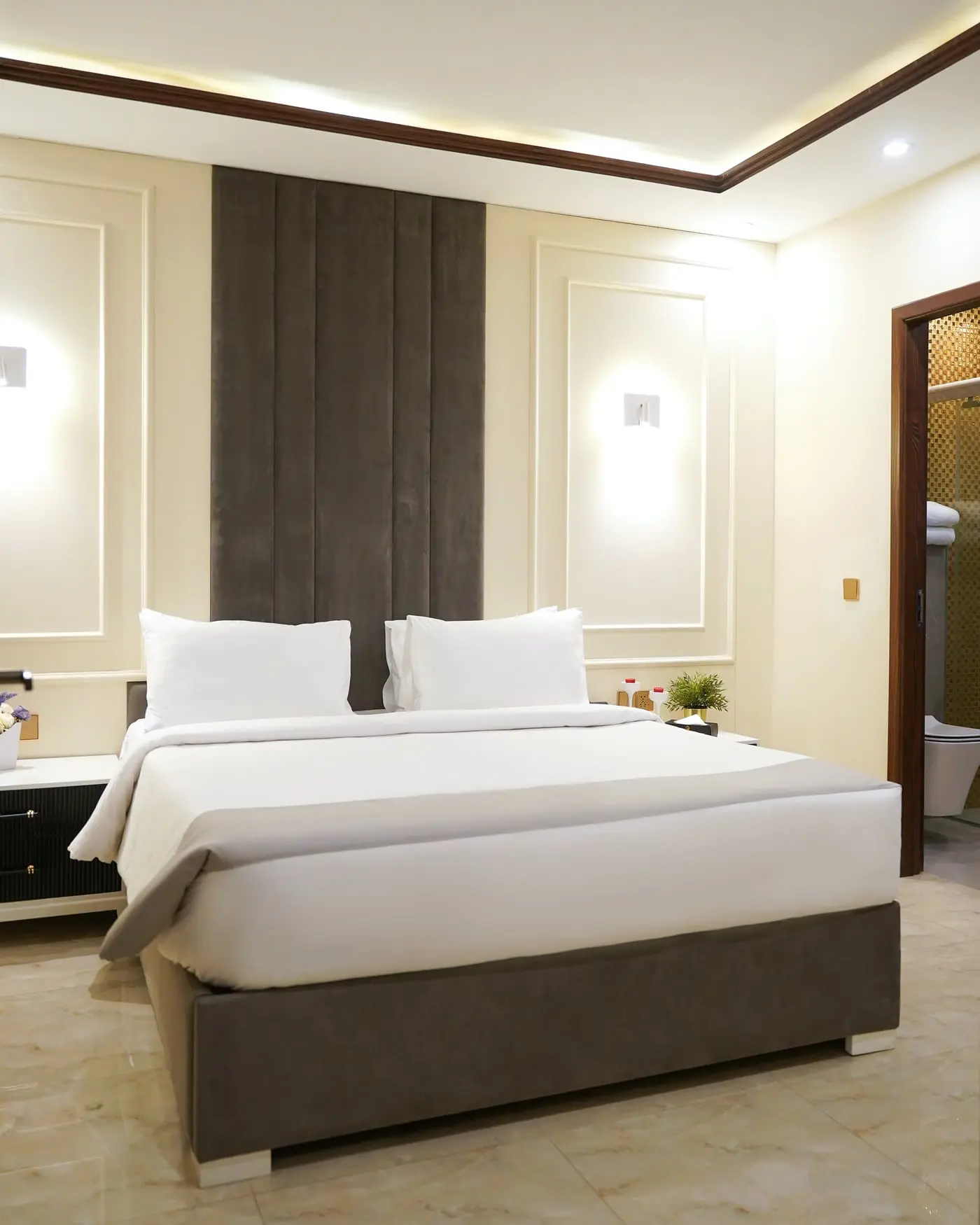 A guest room with a king bed