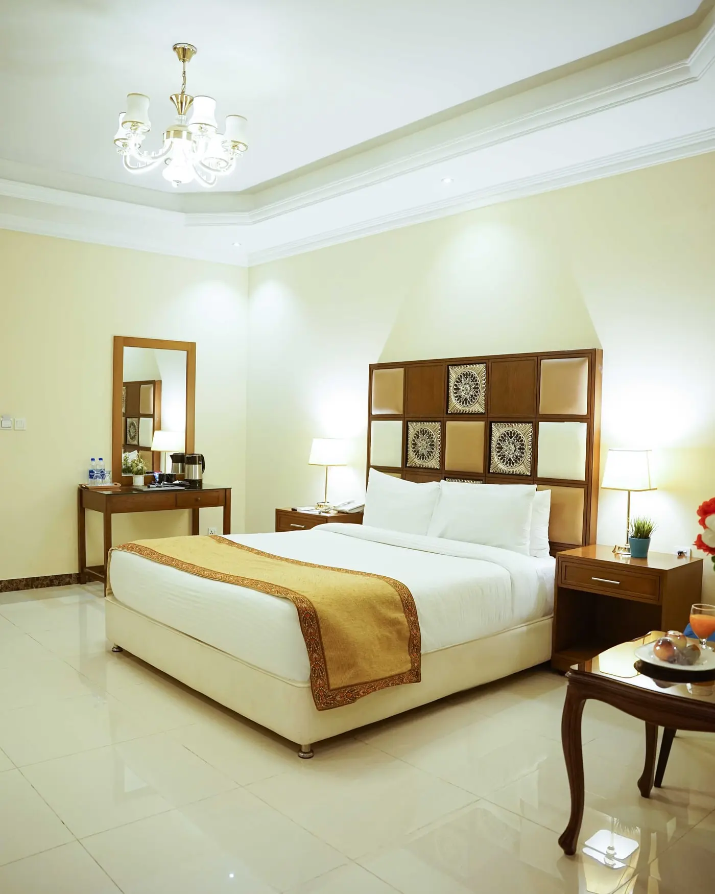 A king room with a marble floor at Faletti’s Grand Gujranwala