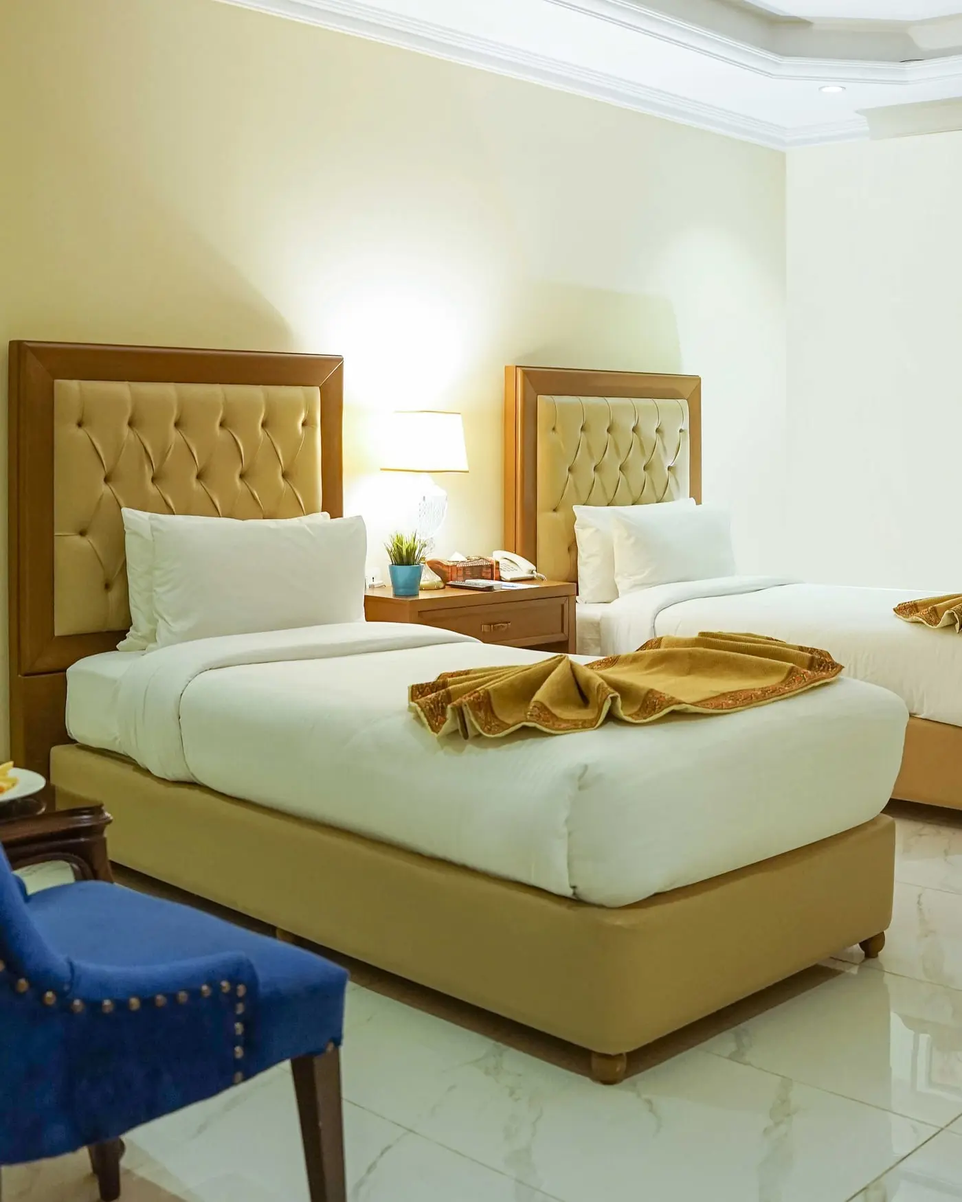 A twin-bed room at Faletti’s Grand Gujranwala