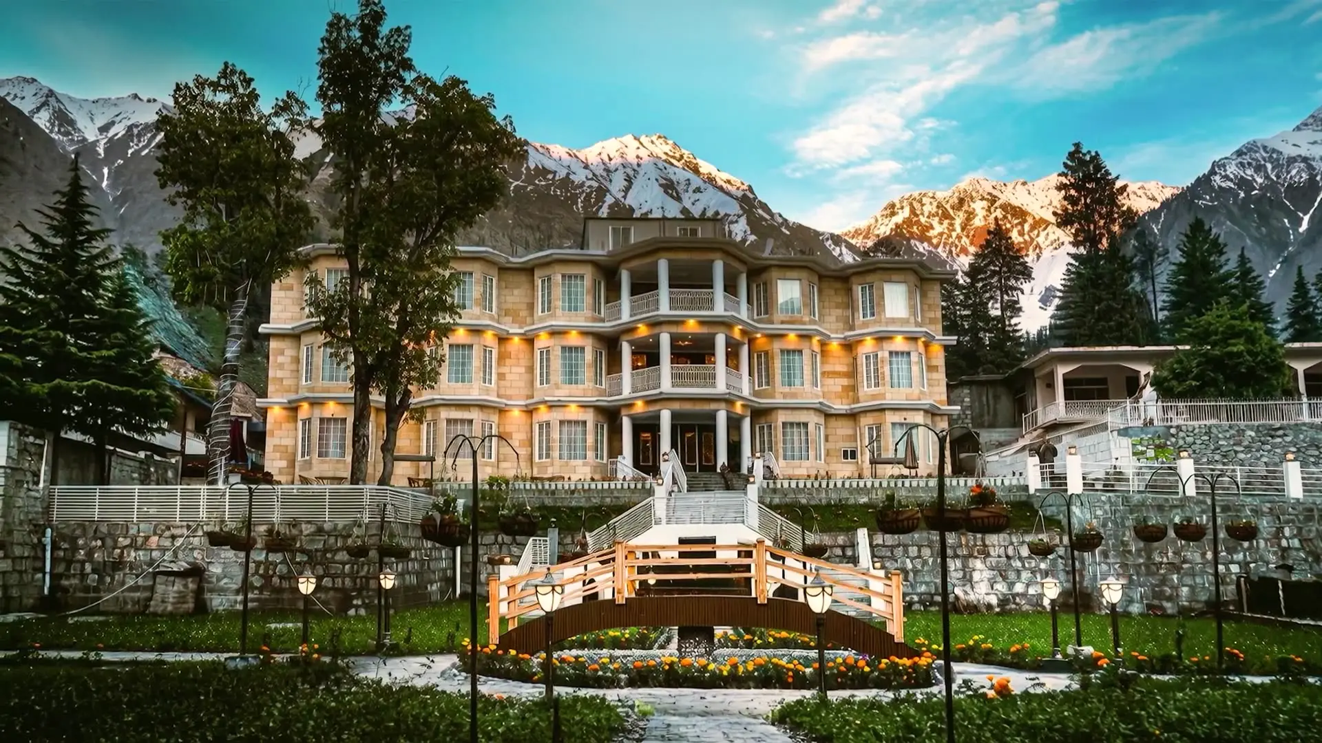 Faletti’s Grand Naran below snow-capped peaks, its terraces and gardens in front