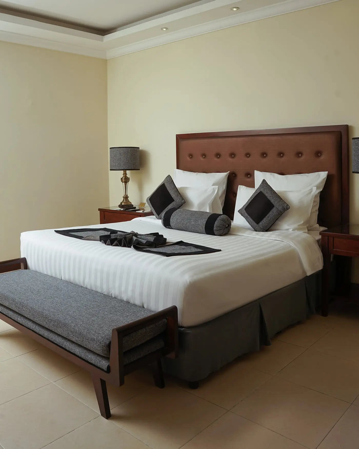 Bedroom with a buttoned headboard