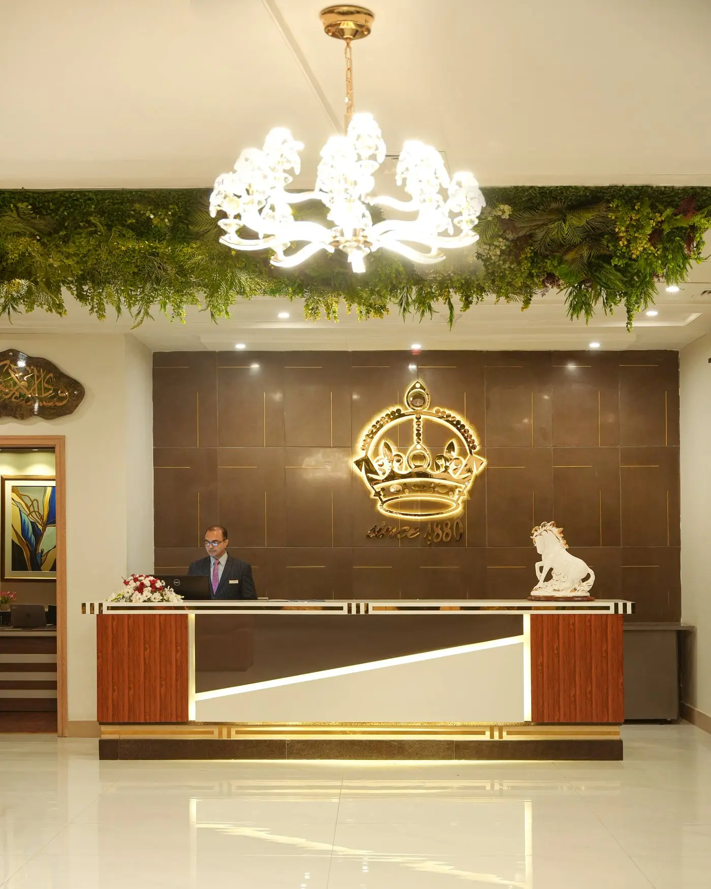 The reception desk and crown crest