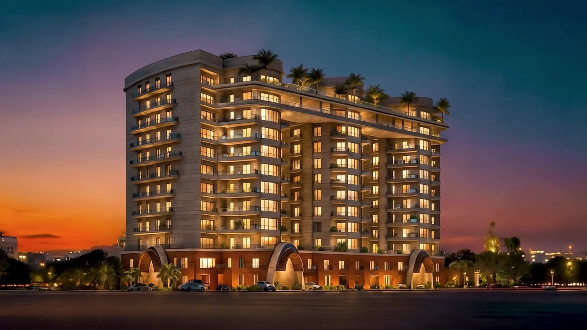 Faletti’s Residences Top City, Islamabad at dusk, its balconies lit against an orange sky
